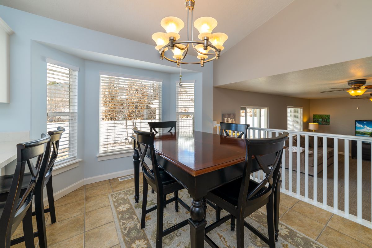 Dark wooden dining table on a light floor