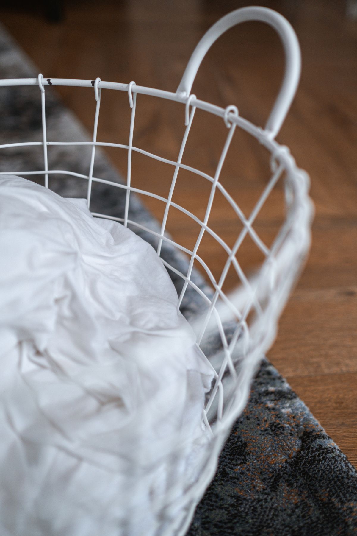 Laundry basket on a wooden floor