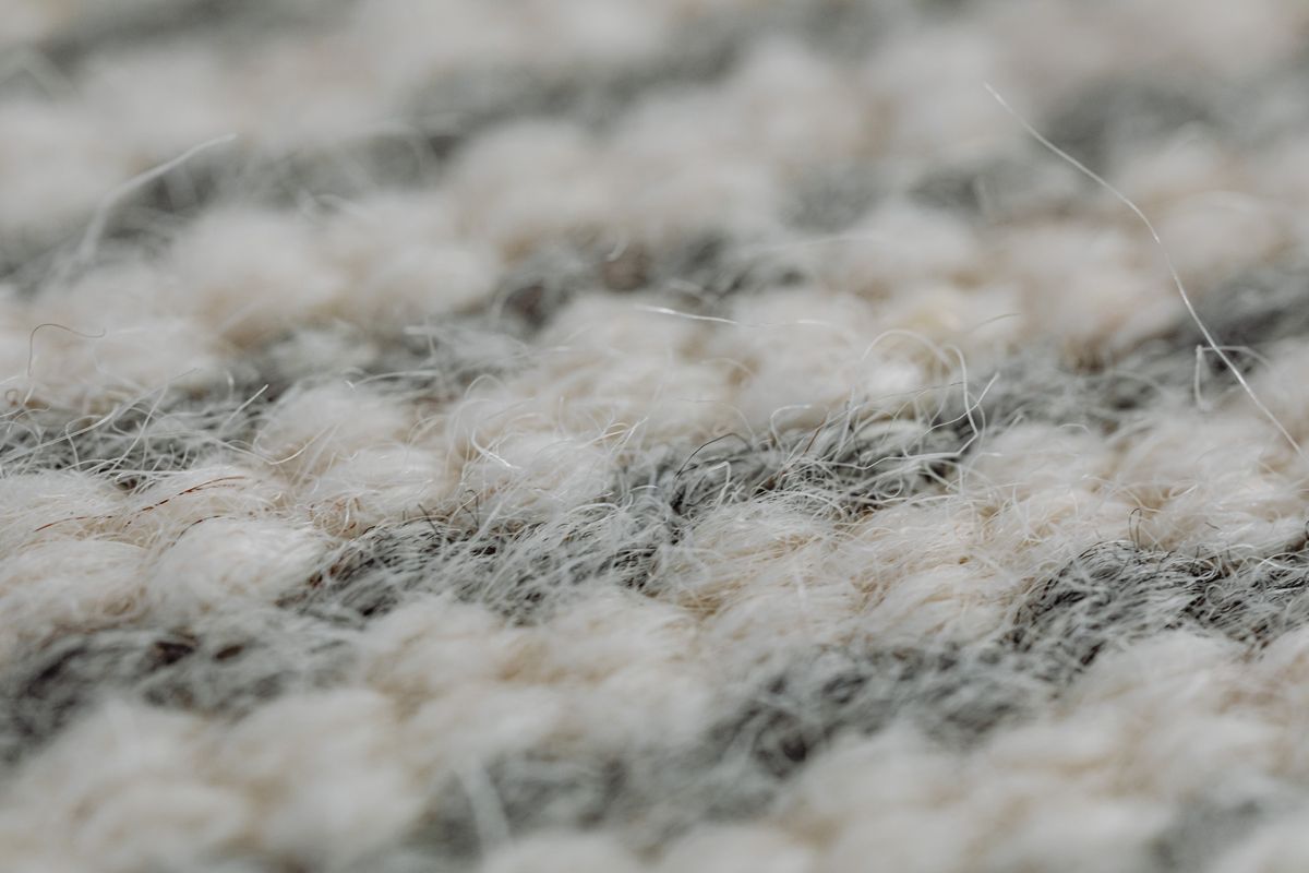Close view of the weave of a wool rug