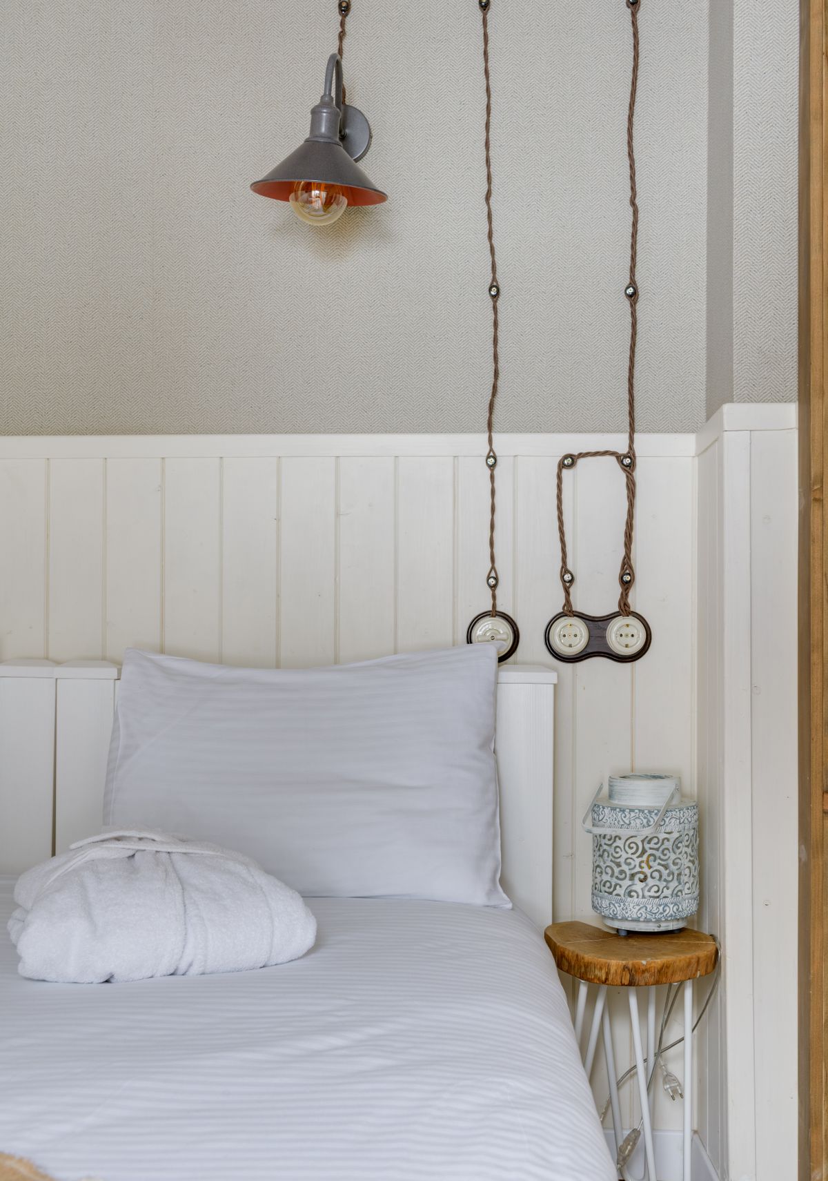 White pillow on a bed