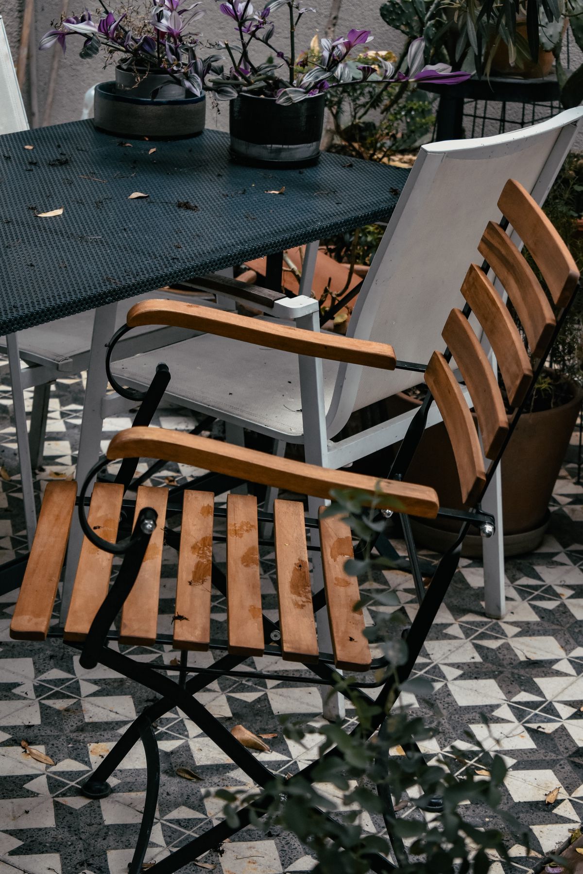 Folding chairs and table on a balcony